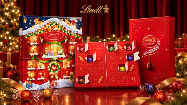 Calendários do Advento Lindt Teddy e Lindor, com janelinhas numeradas e bombons coloridos, diante de decoração natalina.